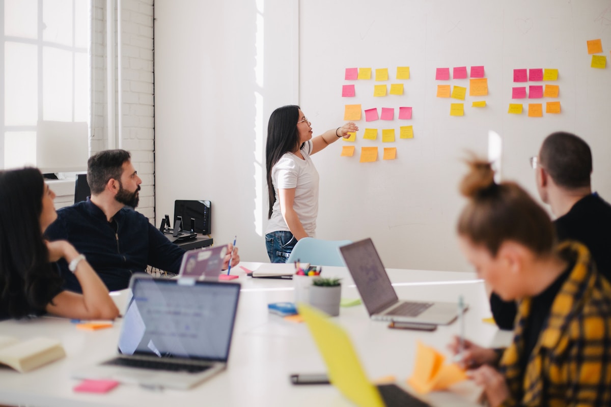 Operations team reviewing service health together (stock photo)
